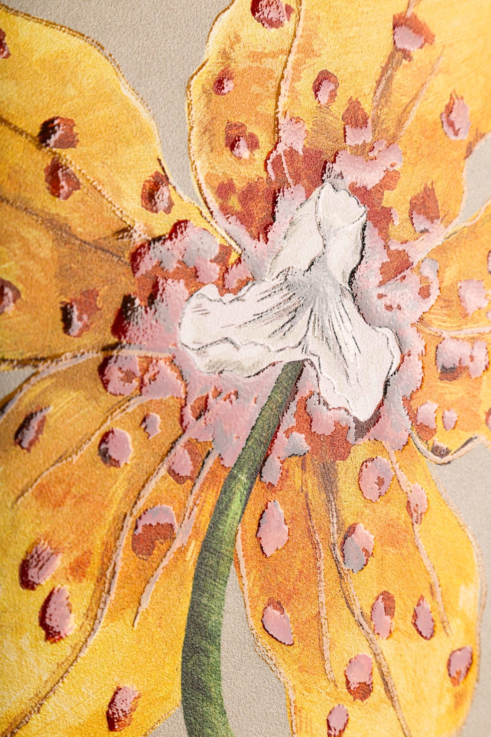 A detail of a large orchid illustration on wallpaper